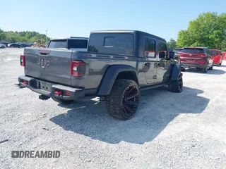 2020 Jeep Gladiator Rubicon with VIN 1C6JJTBG0LL187537, listed as a IAAI auction lot 42018914 with 53,443 mi miles and . Bid and sale history available at DreamBid. Image 4.