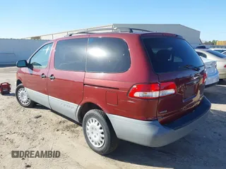 2002 Toyota Sienna CE with VIN 4T3ZF19C62U450159, listed as a IAAI auction lot 41222098 with 251,767 mi miles. Bid and sale history available at carsss.com. Image 3.