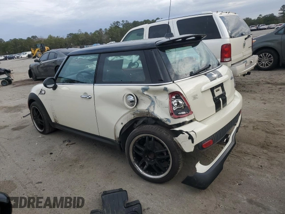 2007 MINI Hardtop S with VIN WMWMF735X7TL83242, listed as a Copart auction lot 41609565 with 83,320 mi miles and Salvage Title. Bid and sale history available at DreamBid. Image 2.