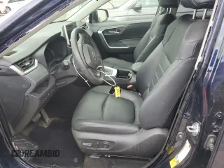 2023 Toyota RAV4 Hybrid XLE Premium with VIN JTMB6RFV2PD097428, listed as a Copart auction lot 52439575 with 13,955 mi miles and Salvage Title. Bid and sale history available at carsss.com. Image 7.