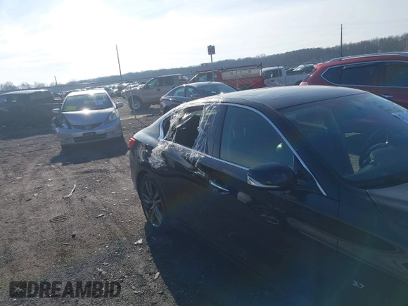2015 Infiniti Q50 Premium z VIN JN1BV7AR9FM416956, wystawiony jako IAAI lot #41149753 z przebiegiem 81 888 mil mil oraz . Historia ofert i sprzedaży dostępna na DreamBid. Obrazek 6.