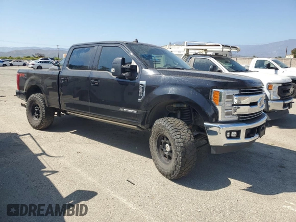 2019 Ford F-350 XL with VIN 1FT8W3BT0KED37509, listed as a Copart auction lot 60283655 with 122,571 mi miles and Salvage title. Bid and sale history available at DreamBid. Image 4.