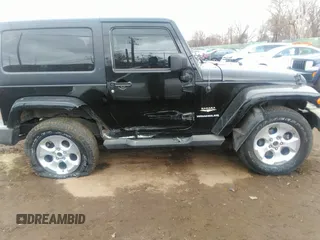 2014 Jeep Wrangler Sahara with VIN 1C4AJWBG9EL161712, listed as a IAAI auction lot 41839193 with 68,318 mi miles and . Bid and sale history available at DreamBid. Image 13.