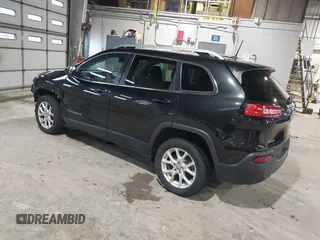 2015 Jeep Cherokee Latitude with VIN 1C4PJMCB5FW768854, listed as a IAAI auction lot 41246213 with 131,112 mi miles. Bid and sale history available at carsss.com. Image 3.