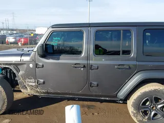 2018 Jeep Wrangler Unlimited Sport S with VIN 1C4HJXDN0JW255003, listed as a IAAI auction lot 41528394 with 55,660 mi miles and . Bid and sale history available at DreamBid. Image 15.