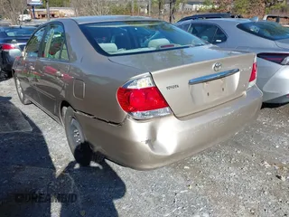 2006 Toyota Camry LE z VIN 4T1BF32K16U118594, wystawiony jako IAAI lot #41558030 z przebiegiem 275 360 mil mil oraz . Historia ofert i sprzedaży dostępna na DreamBid. Obrazek 3.