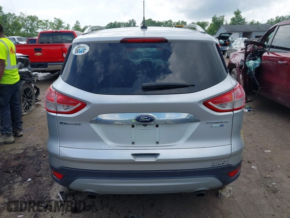 2016 Ford Escape Titanium with VIN 1FMCU9J95GUB93585, listed as a IAAI auction lot 42614106 with 124,465 mi miles and . Bid and sale history available at DreamBid. Image 16.