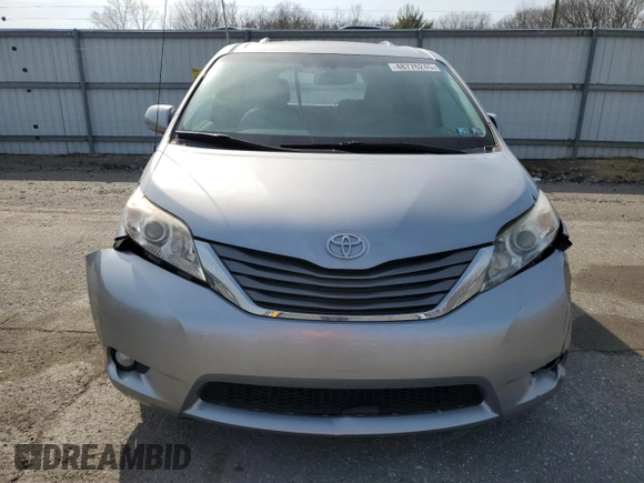 2012 Toyota Sienna XLE AAS with VIN 5TDYK3DCXCS235414, listed as a Copart auction lot 48776245 with 149,658 mi miles and Salvage Title. Bid and sale history available at carsss.com. Image 5.