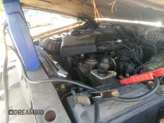 2000 Ford Explorer z VIN 1FMDU70E3YUB02516, wystawiony jako IAAI lot #42848390 z przebiegiem 183 280 mil mil oraz . Historia ofert i sprzedaży dostępna na DreamBid. Obrazek 6.