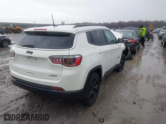 2019 Jeep Compass Latitude with VIN 3C4NJCBB4KT778018, listed as a IAAI auction lot 41900231 with 102,651 mi miles and . Bid and sale history available at carsss.com. Image 4.