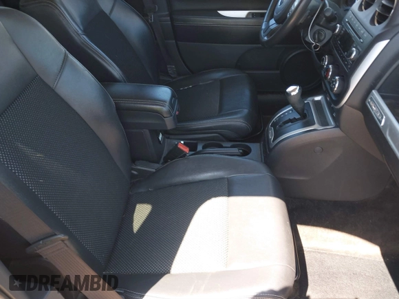 2014 Jeep Compass Latitude with VIN 1C4NJDEB9ED558420, listed as a IAAI auction lot 39277541 with 109,213 mi miles and . Bid and sale history available at carsss.com. Image 5.
