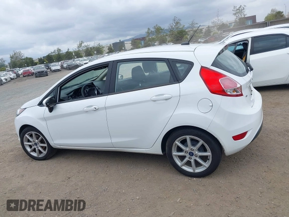 2019 Ford Fiesta SE with VIN 3FADP4EJXKM143274, listed as a IAAI auction lot 42124127 with 85,525 mi miles. Bid and sale history available at carsss.com. Image 14.