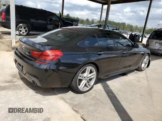 2014 BMW 6 Series 640i z VIN WBA6A0C5XED317733, wystawiony jako Copart lot #51289785 z przebiegiem 120 455 mil mil oraz Szkoda całkowita • Salvage title. Historia ofert i sprzedaży dostępna na DreamBid. Obrazek 3.
