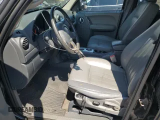 2005 Jeep Liberty Limited with VIN 1J8GL58K05W711624, listed as a Copart auction lot 62479315 with 138,904 mi miles and Salvage title. Bid and sale history available at DreamBid. Image 7.