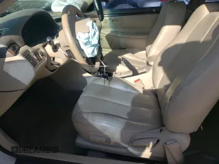 1999 Toyota Solara SE z VIN 2T1CF28P5XC240363, wystawiony jako Copart lot #52326695 z przebiegiem Nie podano mil oraz Szkoda całkowita • Salvage title. Historia ofert i sprzedaży dostępna na DreamBid. Obrazek 7.