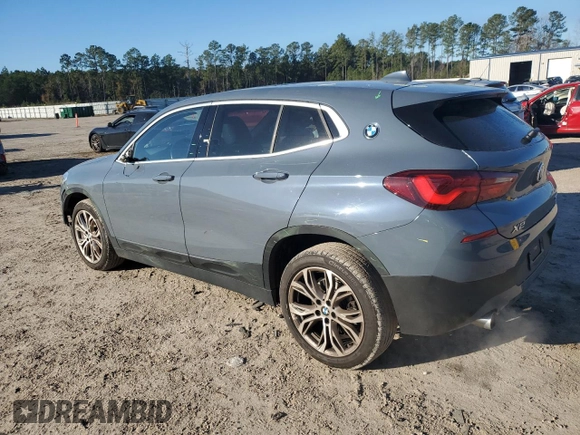 2022 BMW X2 xDrive28i with VIN WBXYJ1C0XN5T67566, listed as a Copart auction lot 86689864 with 42,496 mi miles and Salvage Title. Bid and sale history available at carsss.com. Image 2.