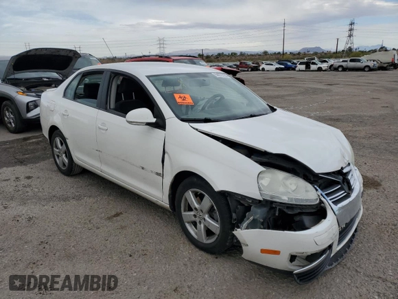 2009 Volkswagen Jetta S with VIN 3VWJM71K69M035974, listed as a Copart auction lot 56979765 with Not provided miles and Salvage title. Bid and sale history available at DreamBid. Image 4.