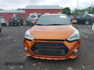 2013 Hyundai Veloster Turbo z VIN KMHTC6AE3DU124744, wystawiony jako IAAI lot #42242242 z przebiegiem 115 757 mil mil oraz . Historia ofert i sprzedaży dostępna na DreamBid. Obrazek 6.