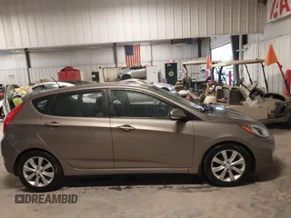 2013 Hyundai Accent SE with VIN KMHCU5AE6DU097353, listed as a IAAI auction lot 41937225 with 173,447 mi miles. Bid and sale history available at carsss.com. Image 13.
