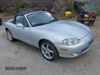2002 Mazda MX-5 Miata Cloth z VIN JM1NB353720220646, wystawiony jako IAAI lot #42023002 z przebiegiem 50 392 mil mil oraz . Historia ofert i sprzedaży dostępna na DreamBid. Obrazek 1.