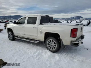 2014 GMC Sierra 1500 Denali with VIN 3GTU2WEJ6EG455647, listed as a Copart auction lot 41509395 with 128,883 mi miles and Salvage Title. Bid and sale history available at carsss.com. Image 2.