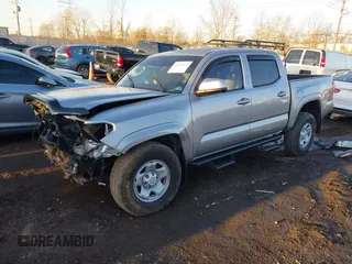 2021 Toyota Tacoma SR z VIN 3TMCZ5AN5MM386394, wystawiony jako IAAI lot #41821364 z przebiegiem 54 070 mil mil oraz . Historia ofert i sprzedaży dostępna na DreamBid. Obrazek 2.