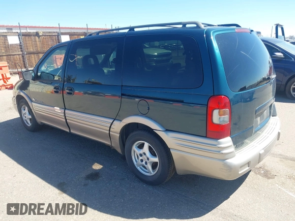 1999 Pontiac Montana with VIN 1GMDX03E0XD166084, listed as a IAAI auction lot 41872976 with 196,027 mi miles and . Bid and sale history available at DreamBid. Image 3.