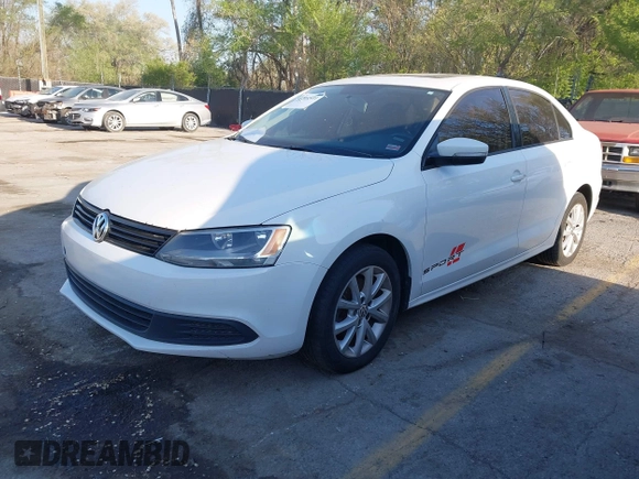 2012 Volkswagen Jetta Sedan SE w/Convenience & Sunroof with VIN 3VWDX7AJ4CM386885, listed as a IAAI auction lot 42052411 with 328,232 mi miles. Bid and sale history available at carsss.com. Image 2.