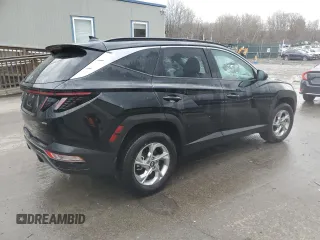 2023 Hyundai Tucson SEL with VIN 5NMJBCAE2PH270674, listed as a Copart auction lot 82879614 with 11,673 mi miles and Salvage Title. Bid and sale history available at DreamBid. Image 3.