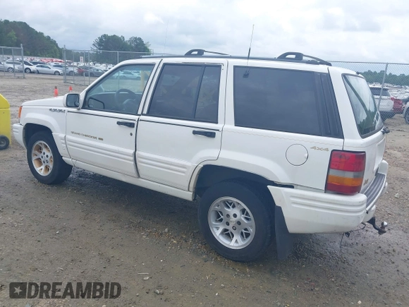 1996 Jeep Grand Cherokee Limited z VIN 1J4GZ78YXTC191527, wystawiony jako IAAI lot #42352616 z przebiegiem 325 927 mil mil oraz . Historia ofert i sprzedaży dostępna na DreamBid. Obrazek 3.