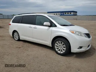 2012 Toyota Sienna XLE с VIN 5TDDK3DC8CS043732, выставлен на аукционе Copart как лот 58037885 с пробегом 234 881 миль миль и Списание • Salvage title. История ставок и продаж доступна на DreamBid. Изображение 4.