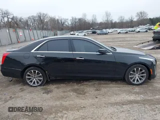 2016 Cadillac CTS Luxury Collection AWD with VIN 1G6AX5SS9G0194228, listed as a IAAI auction lot 41504476 with 94,573 mi miles and . Bid and sale history available at DreamBid. Image 12.