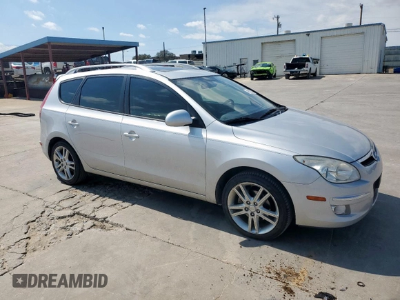 2012 Hyundai Elantra Touring SE with VIN KMHDC8AE6CU147482, listed as a Copart auction lot 48552545 with 142,384 mi miles and Salvage Title. Bid and sale history available at carsss.com. Image 4.