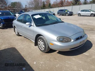 1999 Mercury Sable GS with VIN 1MEFM50U0XG609913, listed as a IAAI auction lot 41783308 with 80,022 mi miles. Bid and sale history available at carsss.com. Image 1.