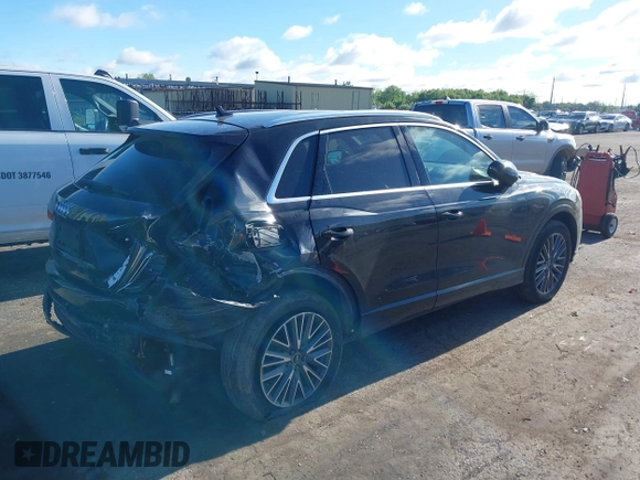 2022 Audi Q3 Premium with VIN WA1AUCF34N1016242, listed as a IAAI auction lot 42341953 with 53,650 mi miles and . Bid and sale history available at DreamBid. Image 4.