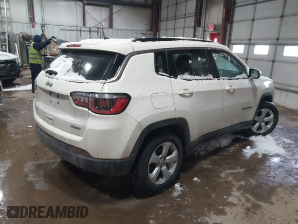 2020 Jeep Compass Latitude with VIN 3C4NJDBB3LT138454, listed as a IAAI auction lot 41614631 with 82,079 mi miles and . Bid and sale history available at DreamBid. Image 4.
