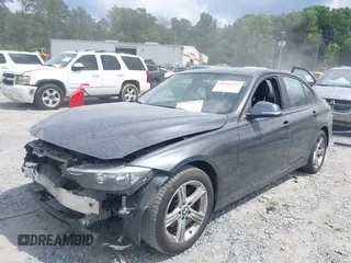 2013 BMW 3 Series 320i with VIN WBA3B1C54DF462873, listed as a IAAI auction lot 39931225 with 118,917 mi miles and . Bid and sale history available at DreamBid. Image 2.