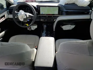 2025 Toyota Camry LE z VIN 4T1DAACK8SU068409, wystawiony jako Copart lot #51927985 z przebiegiem 9603 mil mil oraz Nie do naprawy • Non repairable. Historia ofert i sprzedaży dostępna na DreamBid. Obrazek 8.