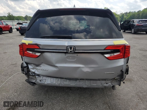 2021 Honda Odyssey Touring z VIN 5FNRL6H85MB039444, wystawiony jako Copart lot #57142205 z przebiegiem 74 228 mil mil oraz Szkoda całkowita • Salvage title. Historia ofert i sprzedaży dostępna na DreamBid. Obrazek 6.