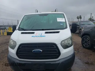 2015 Ford Transit Cargo with VIN 1FTNE1YM6FKA84830, listed as a IAAI auction lot 41635007 with 192,886 mi miles and . Bid and sale history available at DreamBid. Image 13.