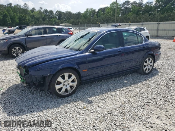 2004 Jaguar X-Type with VIN SAJEA51C44WD83361, listed as a Copart auction lot 55643545 with 54,615 mi miles and Salvage Title. Bid and sale history available at DreamBid. Image 1.