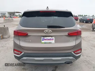 2020 Hyundai Santa Fe SEL z VIN 5NMS3CAD2LH164373, wystawiony jako IAAI lot #42099713 z przebiegiem 49 566 mil mil oraz . Historia ofert i sprzedaży dostępna na DreamBid. Obrazek 16.