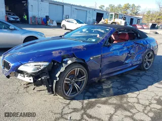 2018 BMW M6 with VIN WBS6G9C56JBM23844, listed as a IAAI auction lot 41206052 with 32,670 mi miles. Bid and sale history available at carsss.com. Image 2.