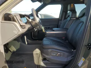 2022 Rivian R1T Launch Edition z VIN 7FCTGAAL3NN003101, wystawiony jako Copart lot #85602634 z przebiegiem 17 189 mil mil oraz Szkoda całkowita • Salvage title. Historia ofert i sprzedaży dostępna na DreamBid. Obrazek 7.