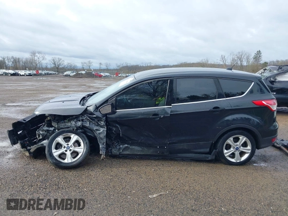 2013 Ford Escape SE with VIN 1FMCU9GX9DUD34661, listed as a IAAI auction lot 41945565 with 239,752 mi miles and . Bid and sale history available at DreamBid. Image 14.