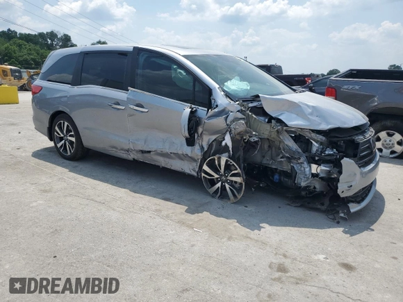 2023 Honda Odyssey Touring z VIN 5FNRL6H8XPB037385, wystawiony jako Copart lot #59461215 z przebiegiem 32 150 mil mil oraz Szkoda całkowita • Salvage title. Historia ofert i sprzedaży dostępna na DreamBid. Obrazek 4.