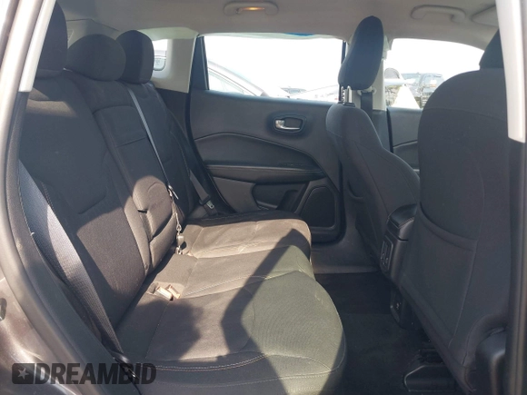 2018 Jeep Compass Sport with VIN 3C4NJDAB2JT136225, listed as a IAAI auction lot 42279668 with 145,967 mi miles and . Bid and sale history available at DreamBid. Image 8.