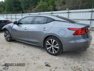 2016 Nissan Maxima SL with VIN 1N4AA6AP0GC379967, listed as a Copart auction lot 60839615 with 107,201 mi miles and Salvage title. Bid and sale history available at DreamBid. Image 2.