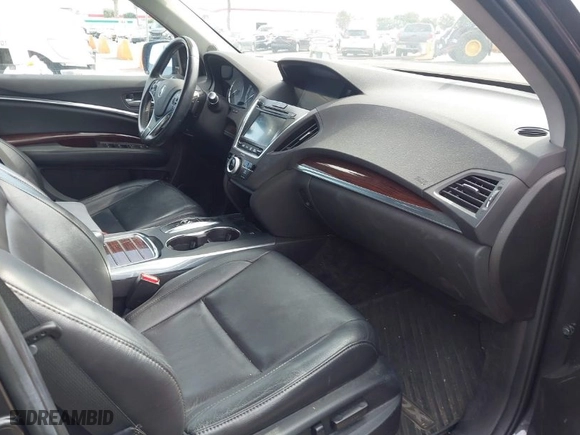 2016 Acura MDX w/Tech with VIN 5FRYD3H40GB011140, listed as a IAAI auction lot 41943684 with 126,131 mi miles. Bid and sale history available at carsss.com. Image 5.