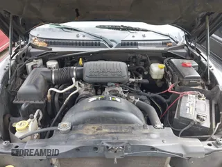 2005 Dodge Dakota SLT z VIN 1D7HE42K55S166266, wystawiony jako IAAI lot #42449608 z przebiegiem 192 728 mil mil oraz . Historia ofert i sprzedaży dostępna na DreamBid. Obrazek 10.